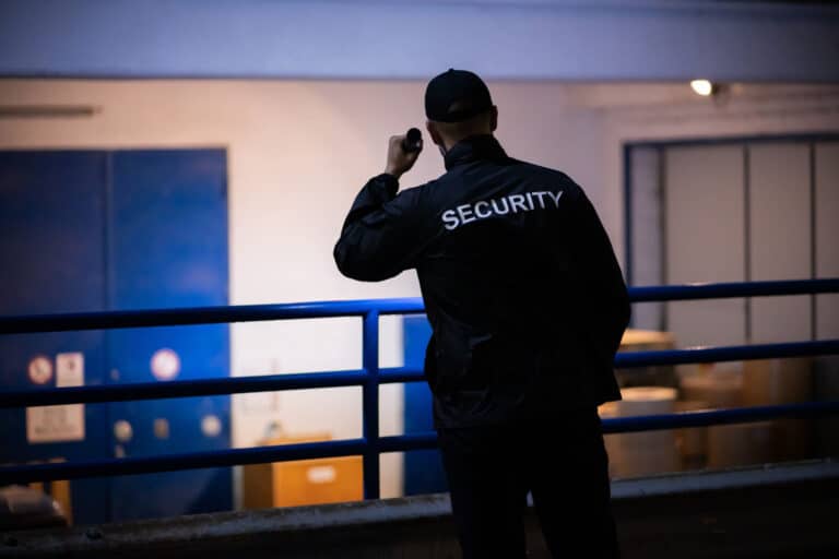 Security Guard Walking Building Perimeter